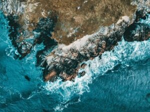 coastline and waves from bird view